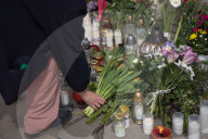 People Mourn The Death Of A Woman Who Was Murdered With An Axe On The Campus Of The University Of Warsaw 