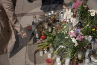 People Mourn The Death Of A Woman Who Was Murdered With An Axe On The Campus Of The University Of Warsaw 
