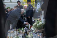 People Mourn The Death Of A Woman Who Was Murdered With An Axe On The Campus Of The University Of Warsaw 