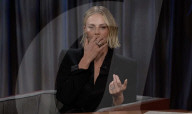 Charlize Theron says kids not impressed with her movie stunts