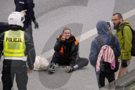 Activists Block Highway By Glueing Their Hands In Warsaw