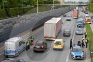 Activists Block Highway By Glueing Their Hands In Warsaw