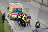 Activists Block Highway By Glueing Their Hands In Warsaw