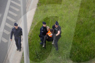 Activists Block Highway By Glueing Their Hands In Warsaw