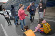 Activists Block Highway By Glueing Their Hands In Warsaw