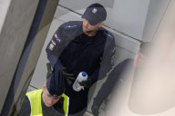 Activists Block Highway By Glueing Their Hands In Warsaw