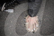Activists Block Highway By Glueing Their Hands In Warsaw