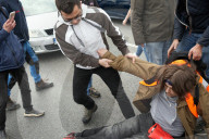 Activists Block Highway By Glueing Their Hands In Warsaw