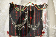 Collection of old Bulgarian towels, clothes and jewelry in Krynychne village