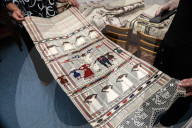 Collection of old Bulgarian towels, clothes and jewelry in Krynychne village