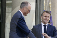 France's President Emmanuel Macron Welcomes Germany's Newly Elected Chancellor Friedrich Merz 