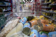 Close-up Of A Shopping Cart Full Of Groceries In A Supermarket