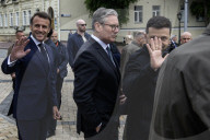 Ukrainian President Volodymyr Zelensky, French President Emmanuel Macron, And UK Prime Minister Keir Starmer Lay Flowers At The Wall Of Remembrance For Fallen Ukrainian Soldiers In Kyiv