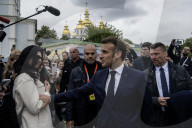 Ukrainian President Volodymyr Zelensky, French President Emmanuel Macron, And UK Prime Minister Keir Starmer Lay Flowers At The Wall Of Remembrance For Fallen Ukrainian Soldiers In Kyiv