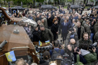 Ukrainian President Volodymyr Zelensky, French President Emmanuel Macron, And UK Prime Minister Keir Starmer Lay Flowers At The Wall Of Remembrance For Fallen Ukrainian Soldiers In Kyiv