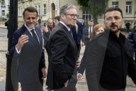 Ukrainian President Volodymyr Zelensky, French President Emmanuel Macron, And UK Prime Minister Keir Starmer Lay Flowers At The Wall Of Remembrance For Fallen Ukrainian Soldiers In Kyiv