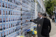 Ukrainian President Volodymyr Zelensky, French President Emmanuel Macron, And UK Prime Minister Keir Starmer Lay Flowers At The Wall Of Remembrance For Fallen Ukrainian Soldiers In Kyiv