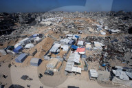 Displaced Gazans take refuge in tents and damaged schools