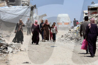 Displaced Gazans take refuge in tents and damaged schools