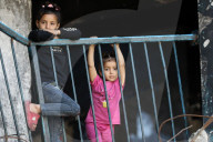 Displaced Gazans take refuge in tents and damaged schools