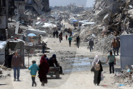 Displaced Gazans take refuge in tents and damaged schools