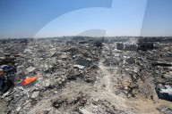 Displaced Gazans take refuge in tents and damaged schools