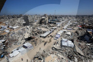 Displaced Gazans take refuge in tents and damaged schools