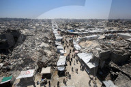 Displaced Gazans take refuge in tents and damaged schools