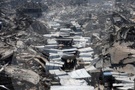 Displaced Gazans take refuge in tents and damaged schools