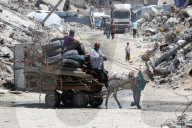 Displaced Gazans take refuge in tents and damaged schools