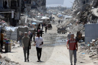 Displaced Gazans take refuge in tents and damaged schools