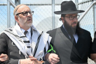 Faith Clergy Forms Human Chain To Block Entrances And Exits To Delaney Hall ICE Immigration Detention Facility