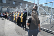 Faith Clergy Forms Human Chain To Block Entrances And Exits To Delaney Hall ICE Immigration Detention Facility