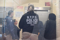 Police Investigation Draws Numerous NYPD Officers To The Scene And Crime Scene Unit Investigators At The NYCHA Houses At 611 Blake Avenue