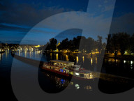 Daily Life By The Riverbank At Vltava River In Prague At Night