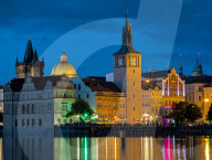 Daily Life By The Riverbank At Vltava River In Prague At Night