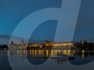 Daily Life By The Riverbank At Vltava River In Prague At Night
