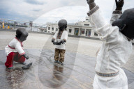 Statues of baby founders of Kyiv in vyshyvankas 
