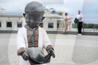 Statues of baby founders of Kyiv in vyshyvankas 