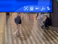 Travelers At Train Station