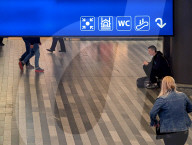 Travelers At Train Station