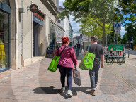 Shoppers With Go Asia Bags