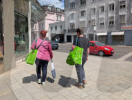 Shoppers With Go Asia Bags