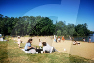People Enjoy The Sun In France