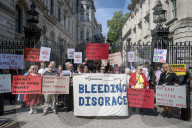 Victims of UK's infected blood scandal demand compensation