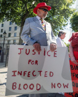 Victims of UK's infected blood scandal demand compensation