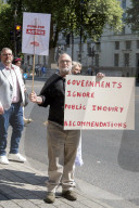 Victims of UK's infected blood scandal demand compensation