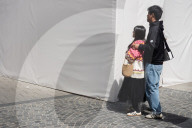 Couple Embracing On The Street