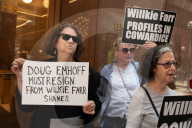 Demonstrators Protest Law Firms That Cut Deals With Trump