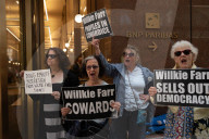 Demonstrators Protest Law Firms That Cut Deals With Trump